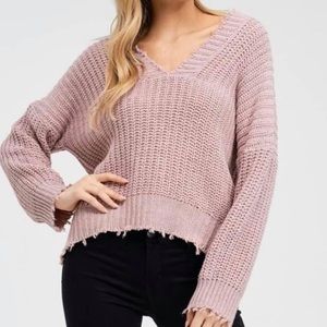 Distressed V-neck sweater
